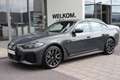 BMW i4 eDrive40 High Executive M Sport 84 kWh / Driving A Grijs - thumbnail 5