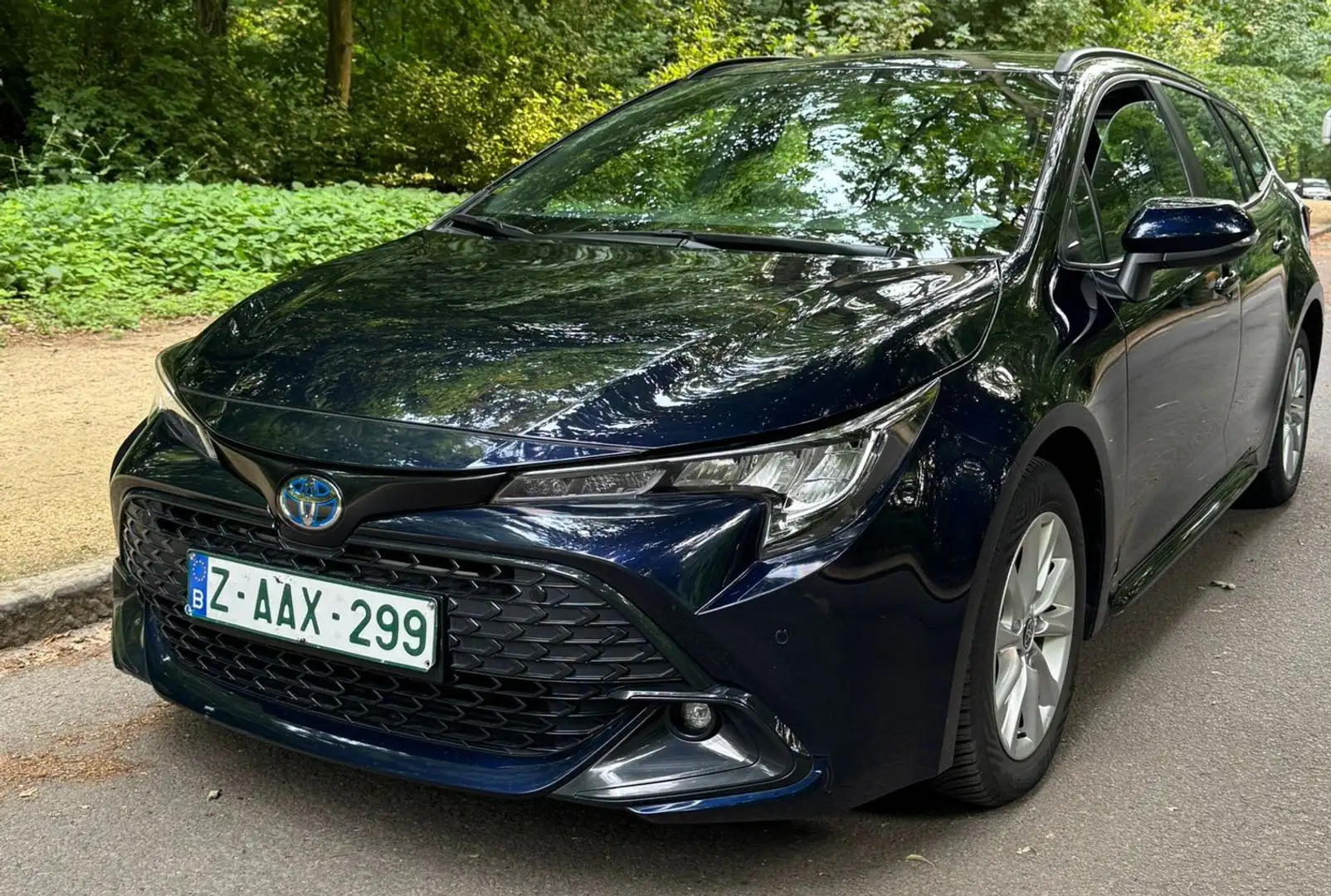 Toyota Corolla TS 1.8 Hybrid Dynamic e-CVT GPF Blauw - 1
