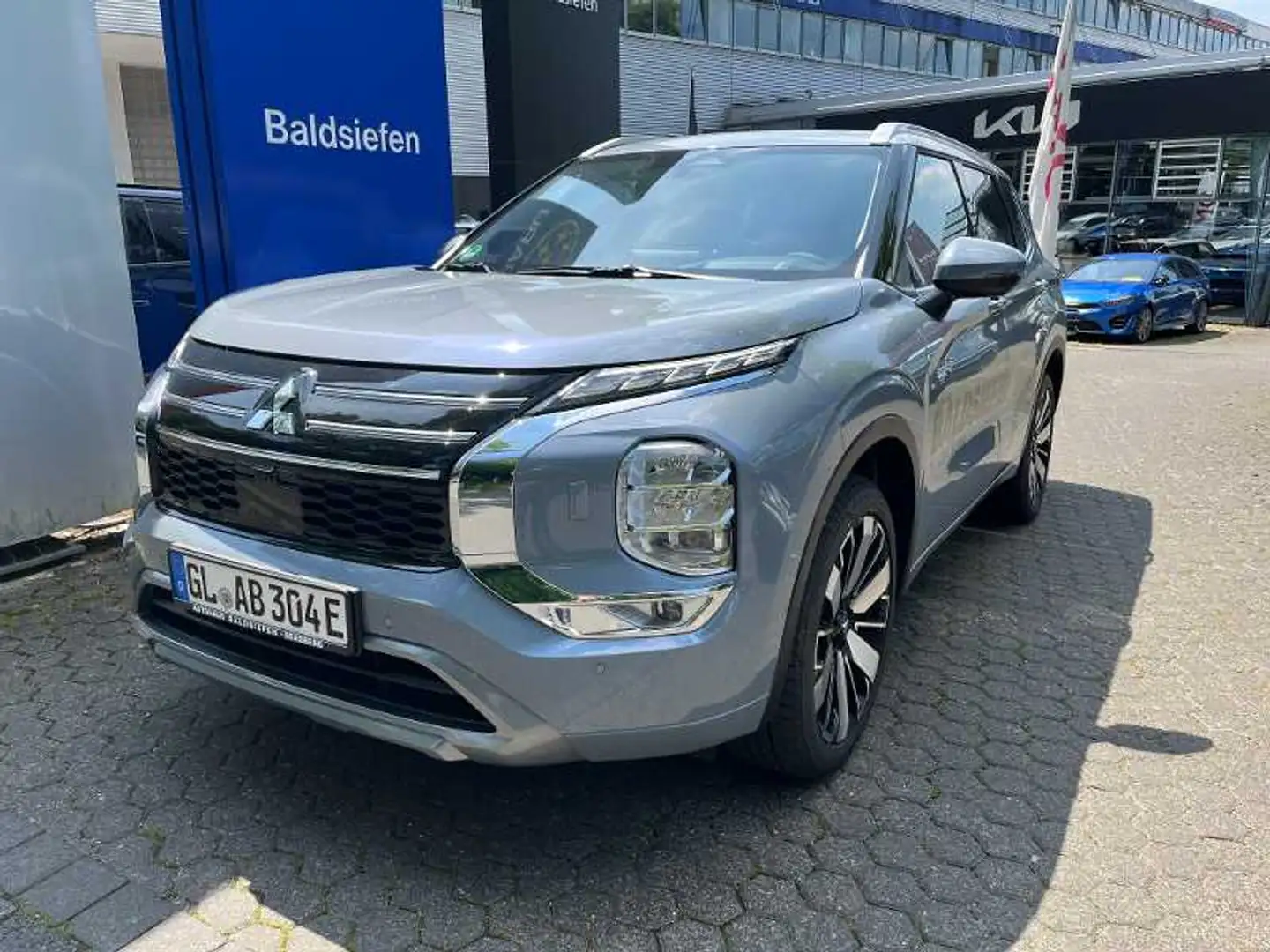 Mitsubishi Outlander 2.4l PHEV TOP, 4WD Grau - 1