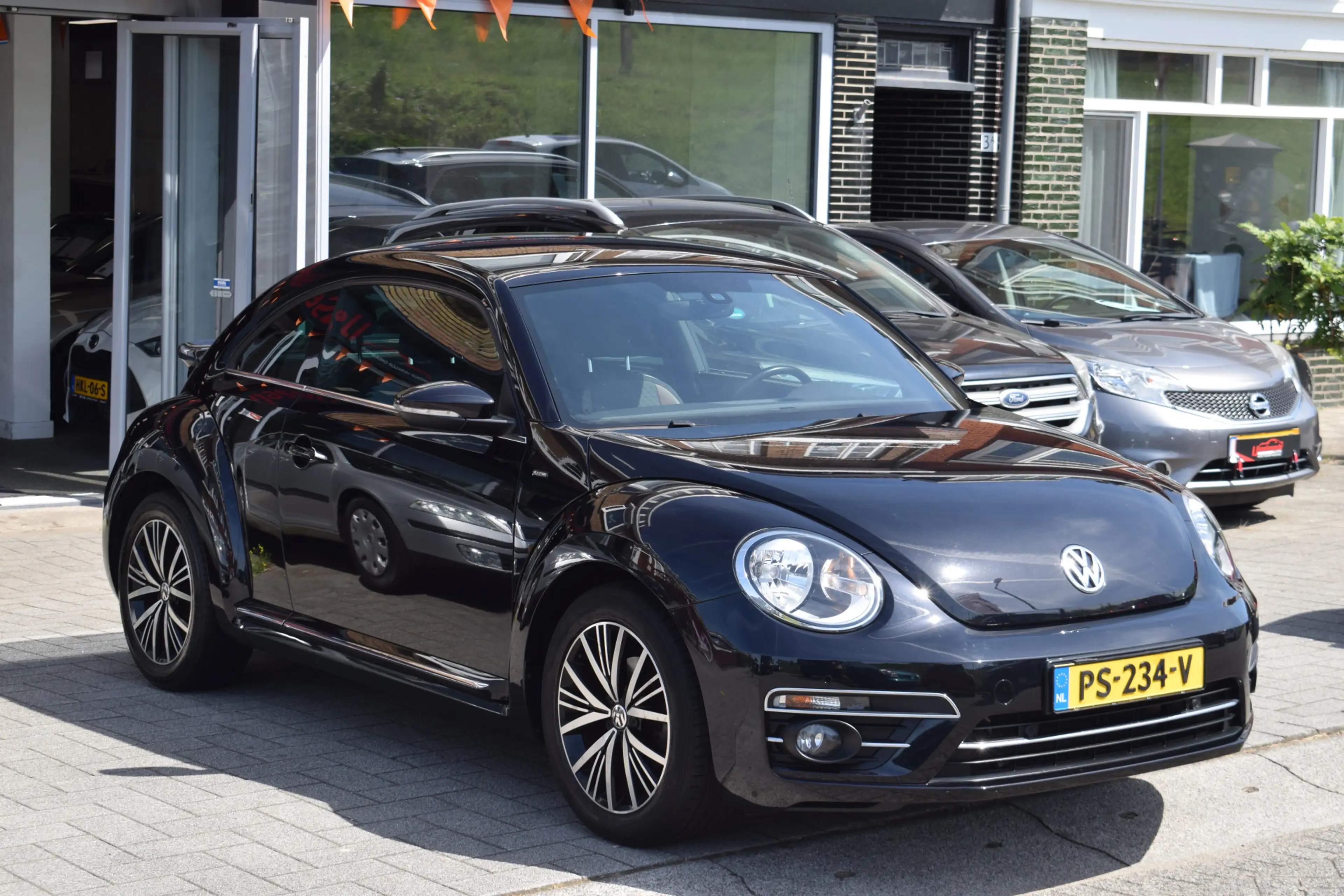 Volkswagen Beetle 1.2 TSI Exclusive Series Apple Carplay Camera PDC — photo 6
