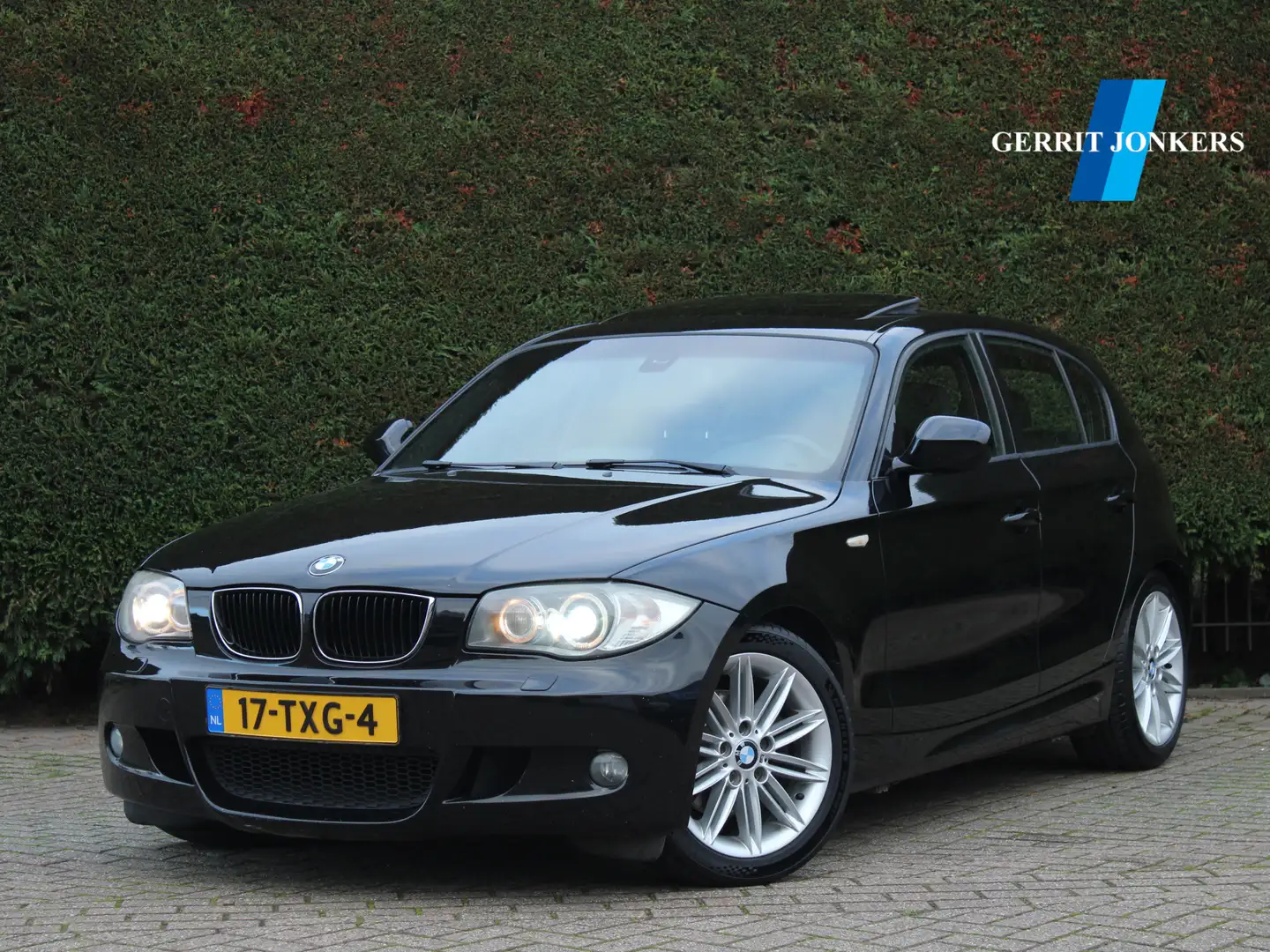 BMW 118 1-serie 118i EffDyn. Ed. Business Line Ultimate Ed Zwart - 1