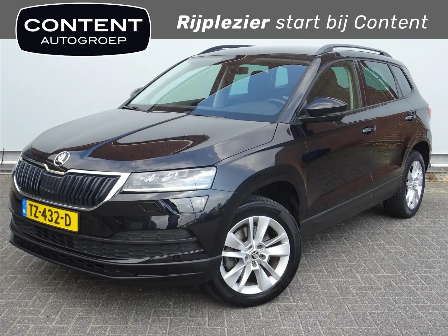 Skoda Karoq 1.0 TSI Greentech 115pk Ambition Business [Trekhaa Negro - 1