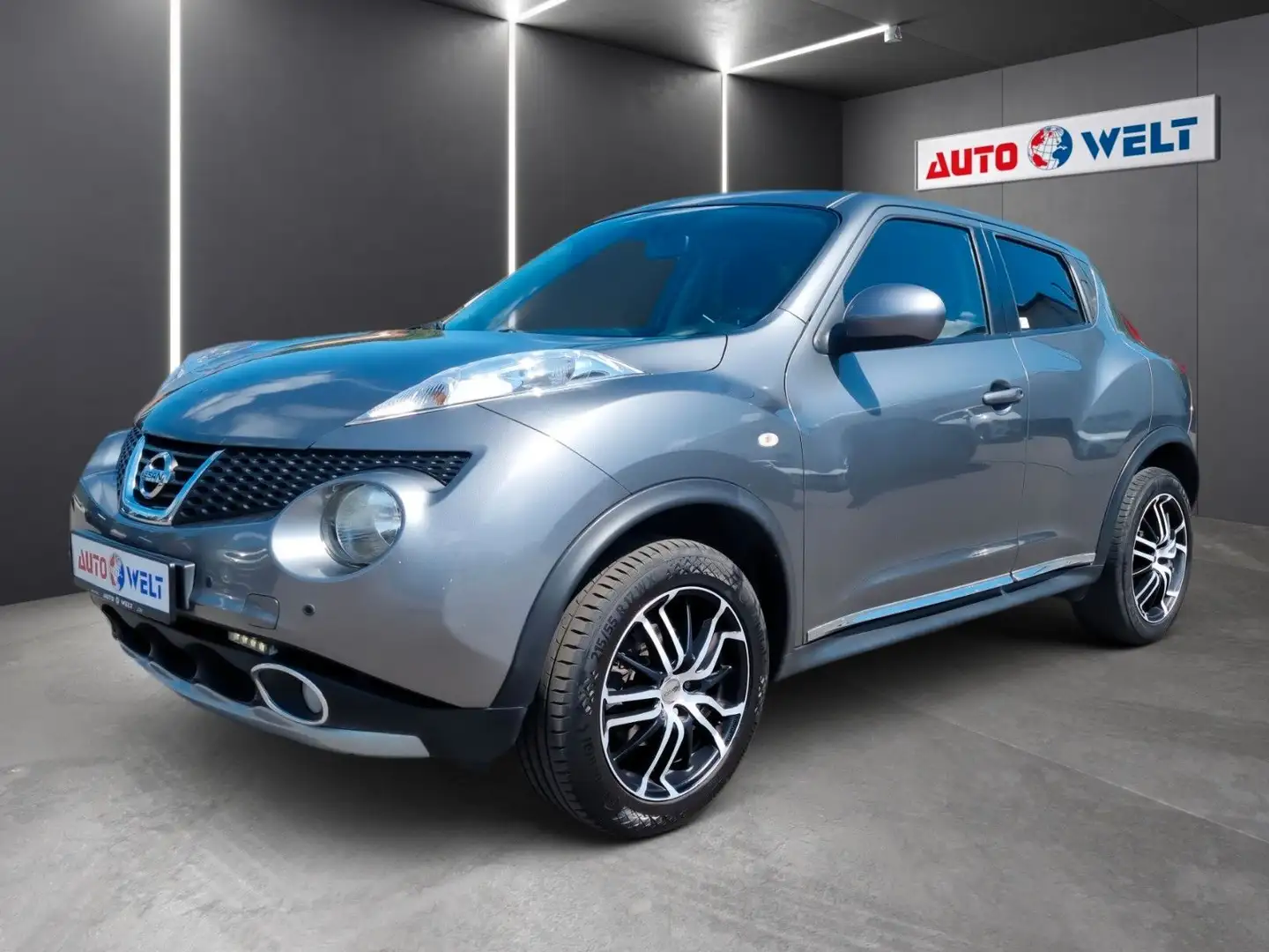 Nissan Juke 1.6 Klimaauto. Navi Sitzhzg R-Cam Tempo Gris - 1