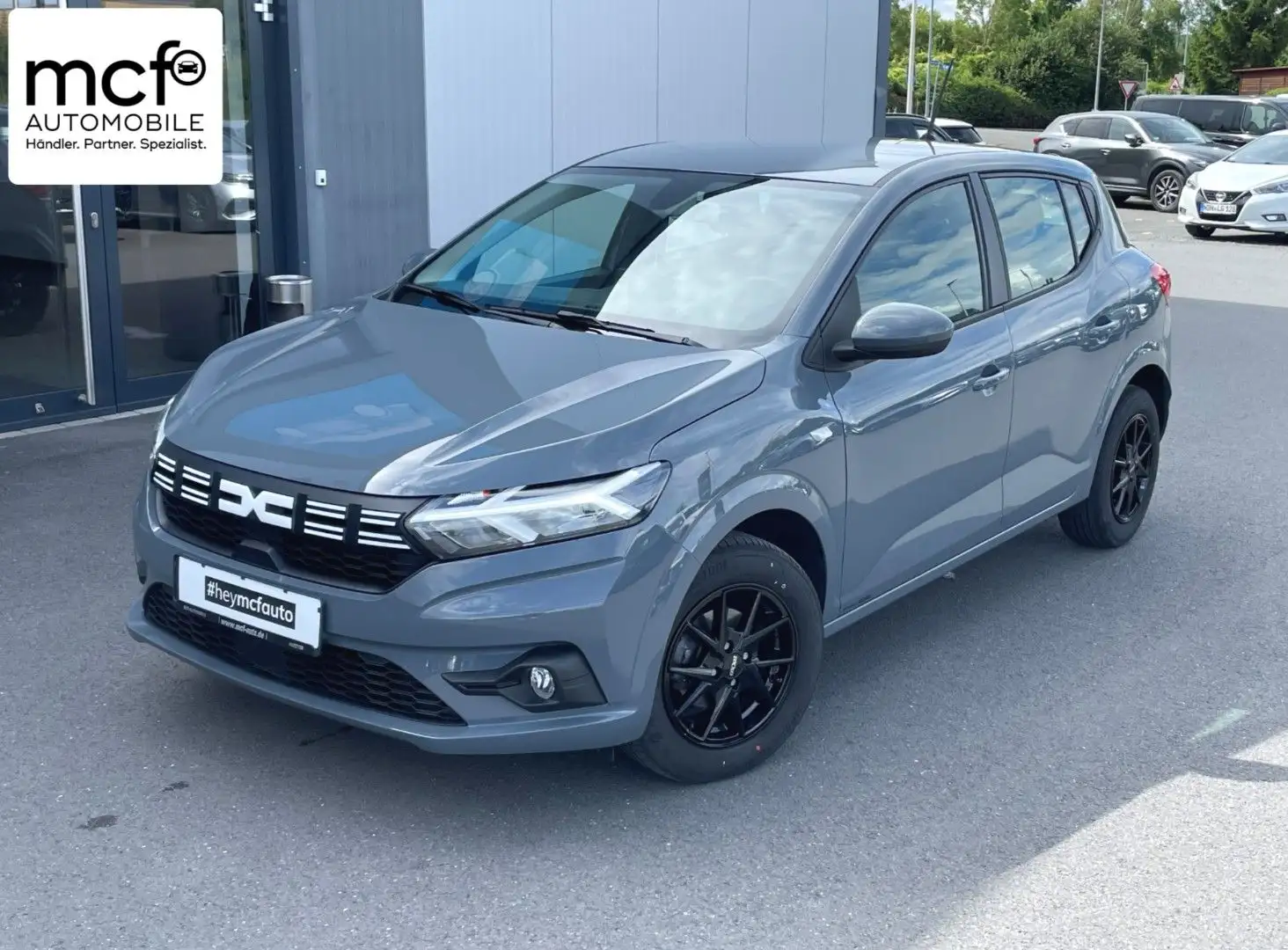 Dacia Sandero TCe 90 Expression *Klima*Tempomat*LED* Grijs - 1