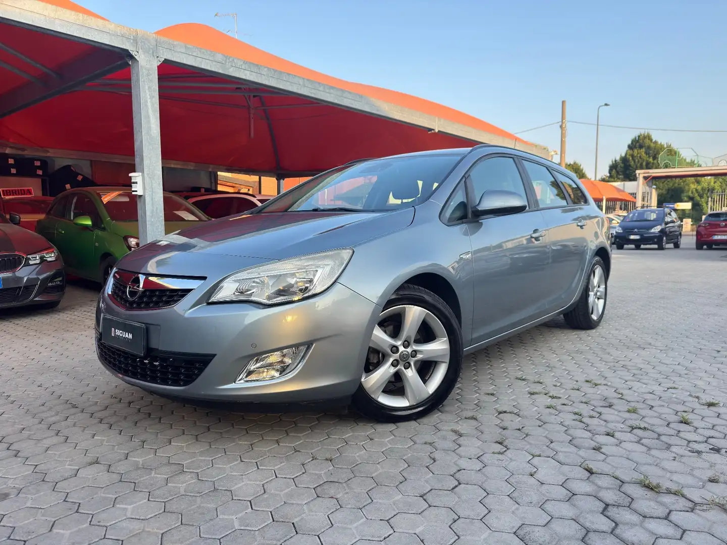 Opel Astra ADATTA A NEOPATENTATI 1.4 100CV Sports Tourer Cosm Grigio - 1