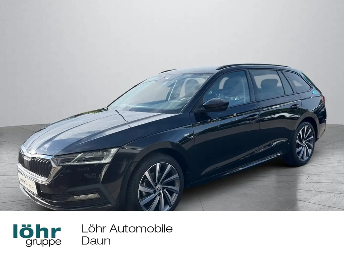 Skoda Octavia Combi 2,0 TDI DSG Noir - 1