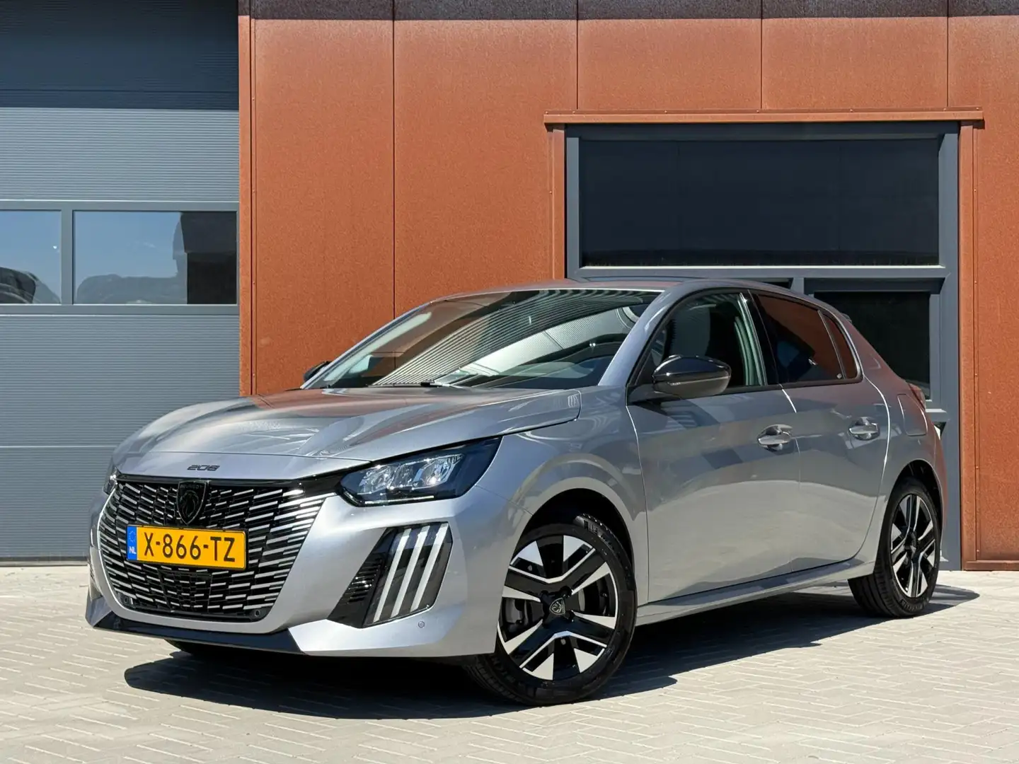 Peugeot 208 1.2 PureTech 100 Allure | Als nieuw | Dealer | NAP Grijs - 1