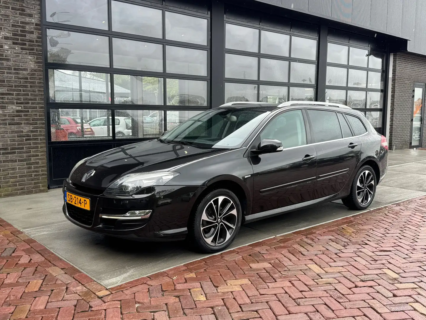 Renault Laguna Estate 1.5 dCi Bose | 1/2 Leer | Navi | Clima | Cr Nero - 1