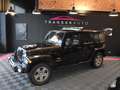 Jeep Wrangler Unlimited Sahara A Zwart - thumbnail 1