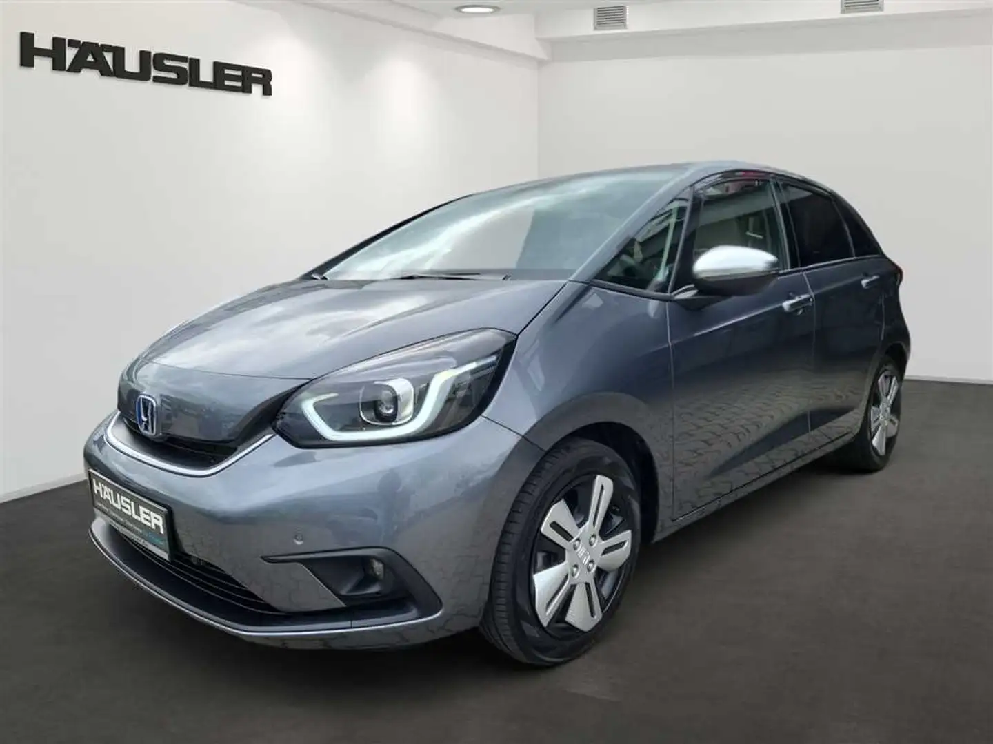 Honda Jazz 1.5 Hybrid Executive Automatik,  Navi, SH, Teilled Grigio - 1