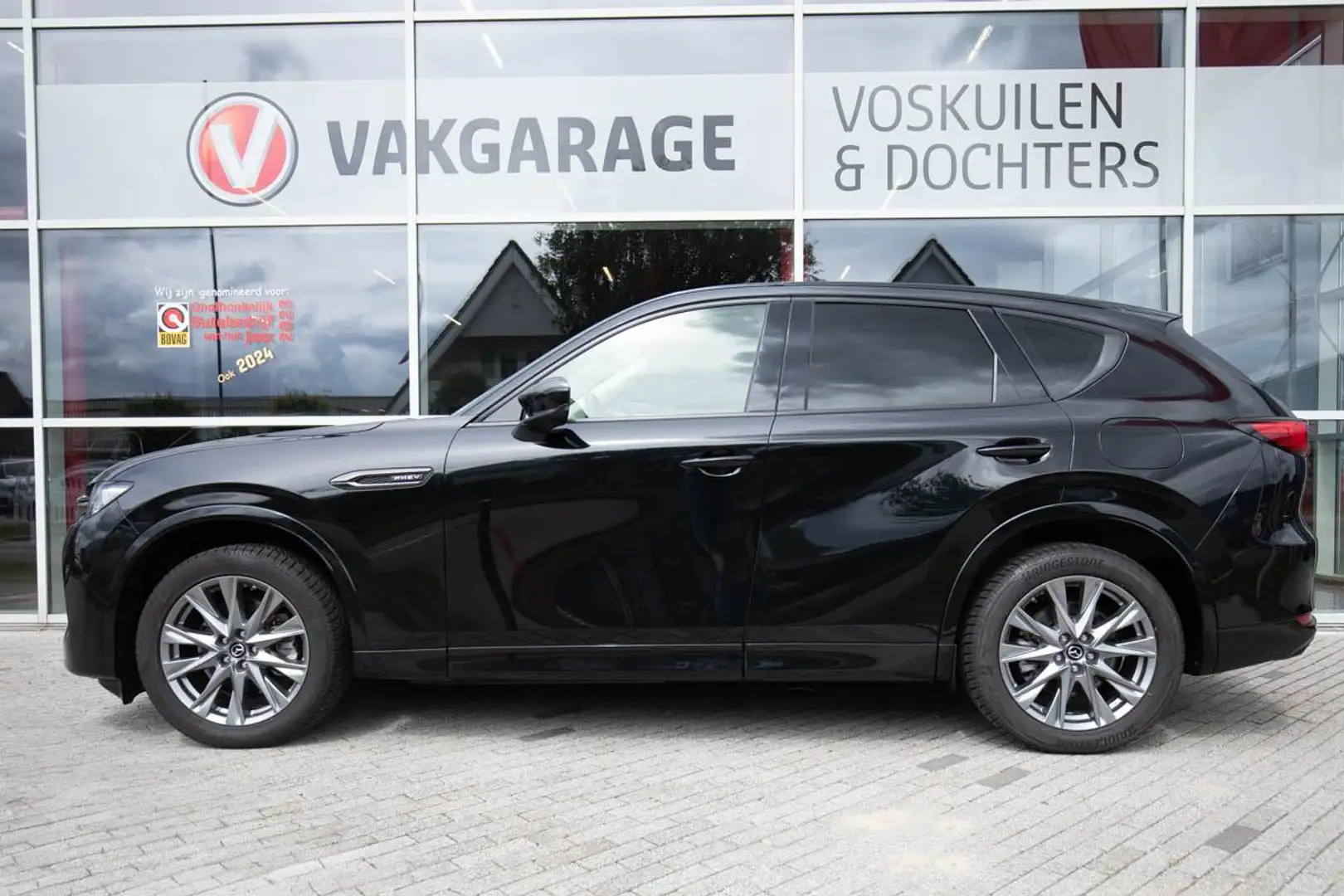 Mazda CX-60 2.5 e-SkyActiv PHEV Homura AWD | 2500kg trekgewich Zwart - 2