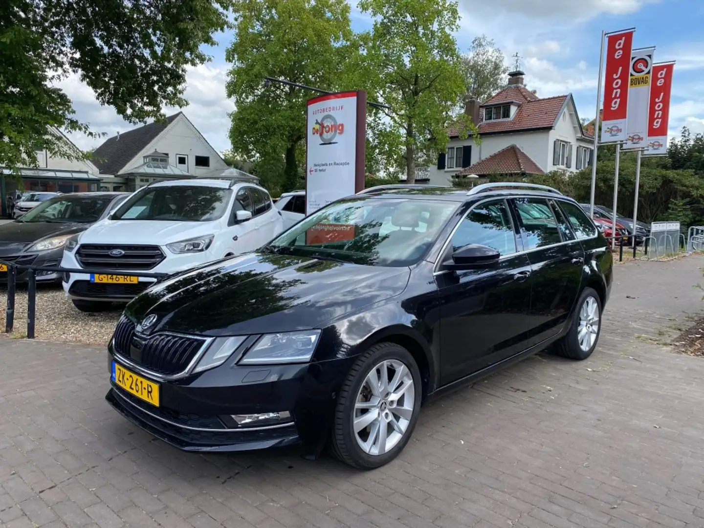 Skoda Octavia COMBI 1.0 TSI STYLE AUTOMAAT / AIRCO-ECC / CARPLAY Negro - 1