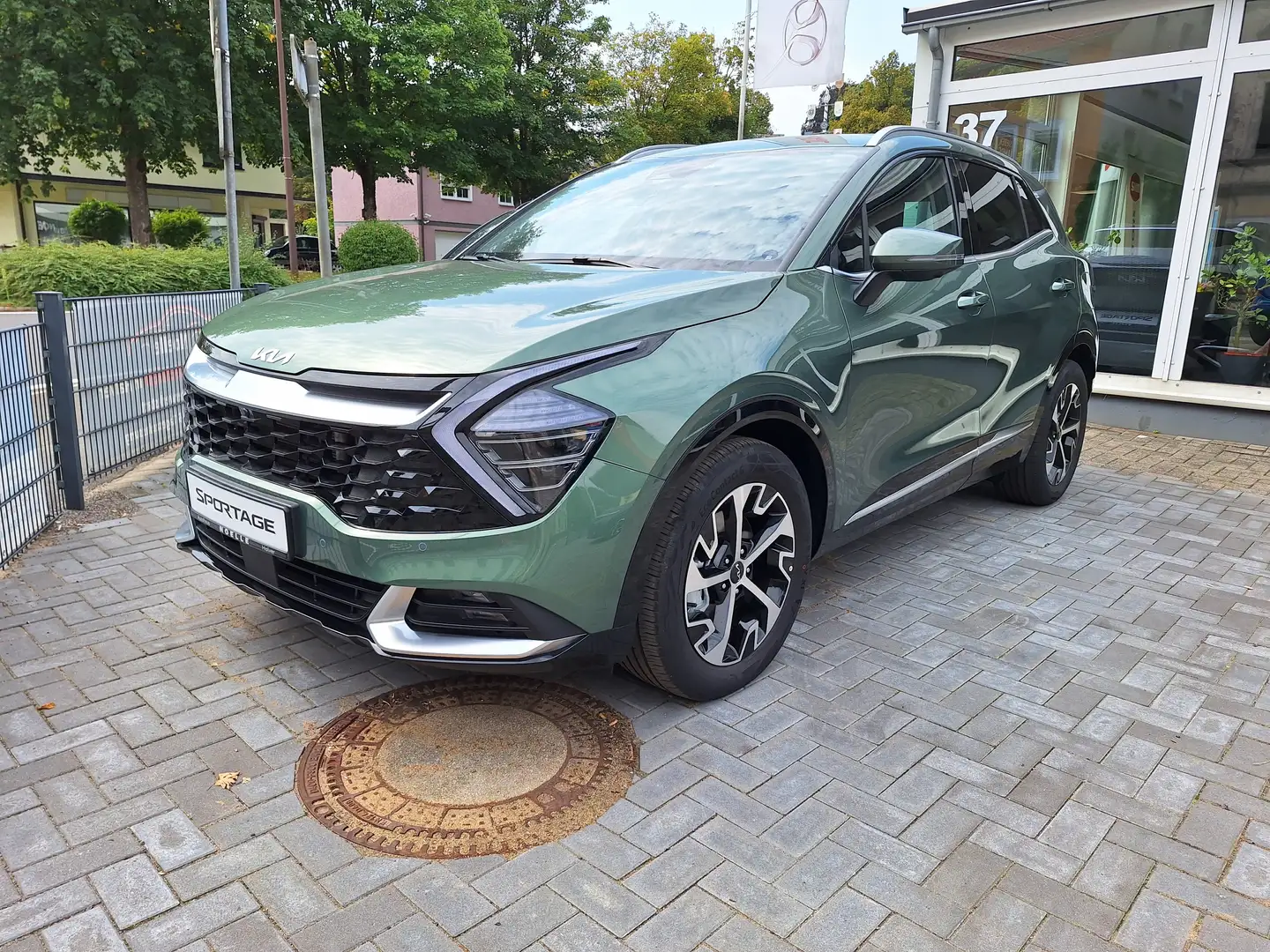 Kia Sportage 1.6 T-GDI 2WD Spirit H&K, Navi, Kamera Verde - 1