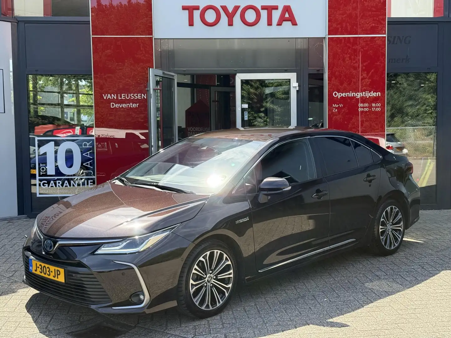 Toyota Corolla 1.8 Hybrid Business Intro STOEL/STUUR VERWARMING, Bruin - 1