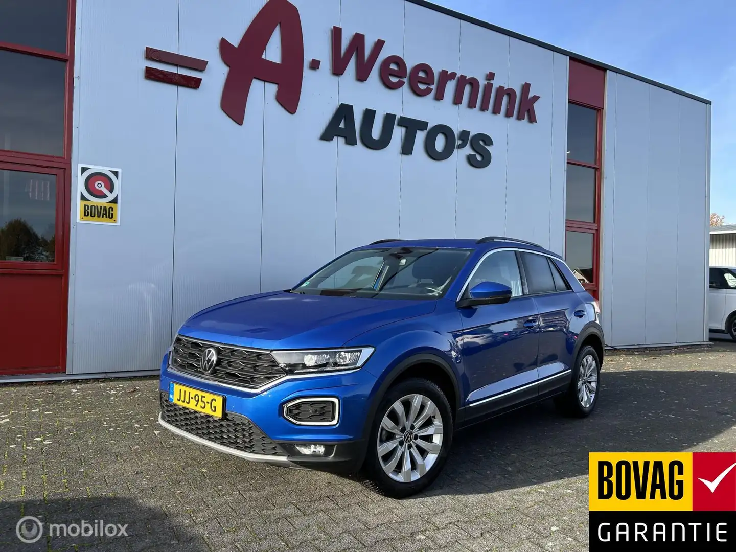 Volkswagen T-Roc 1.5 TSI Sport IQ drive Camera Elec. A. klep. Blauw - 1