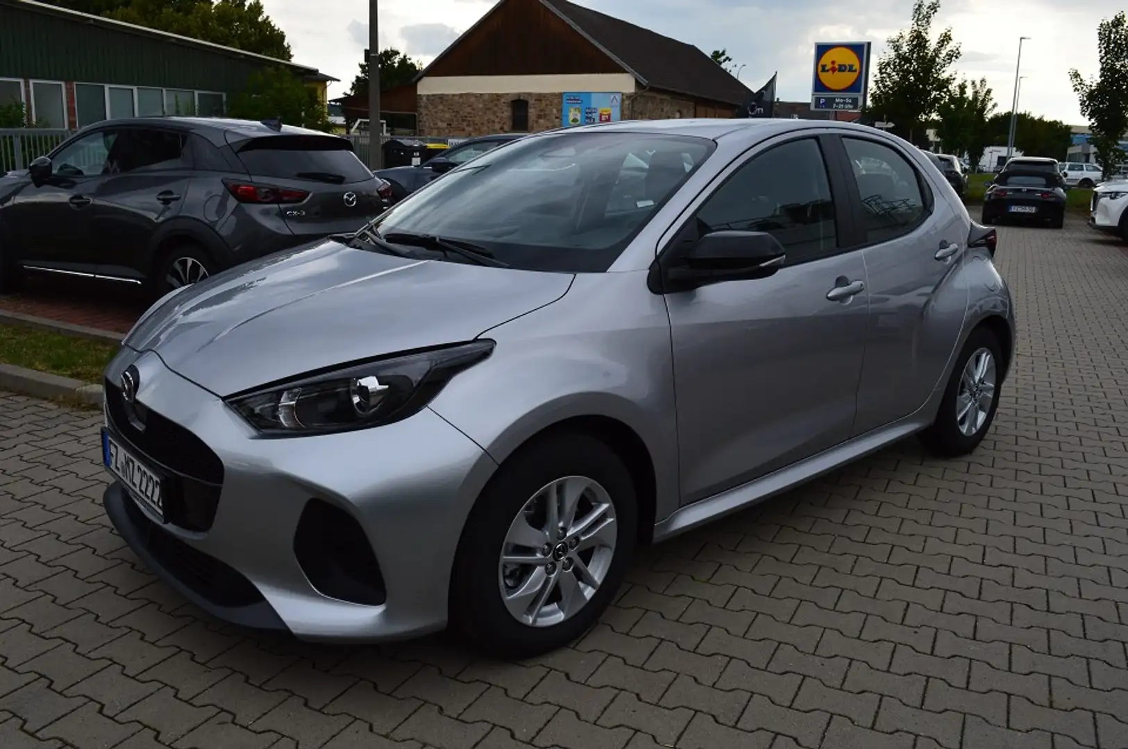 Mazda 2 Hybrid 1.5L Hybrid VVT-i 116 PS e-CVT FWD CENTRE-L Silber - 1