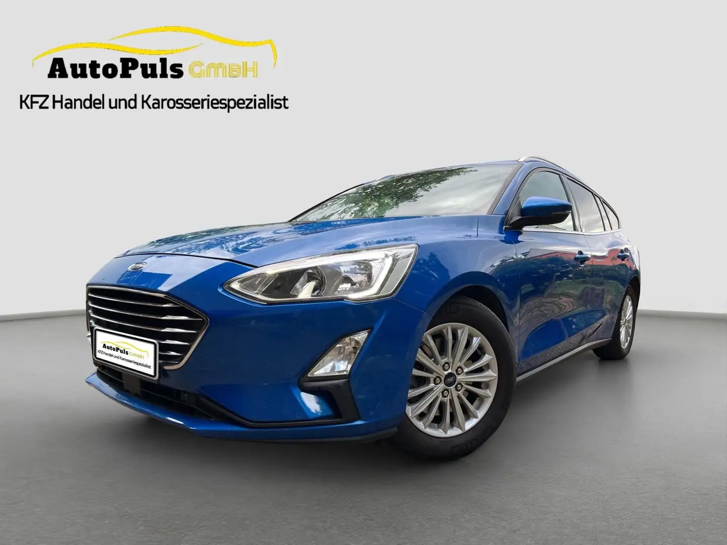 Ford Focus Titanium + Automatik + Navi + Adaptiver Tempomat + Blau - 1