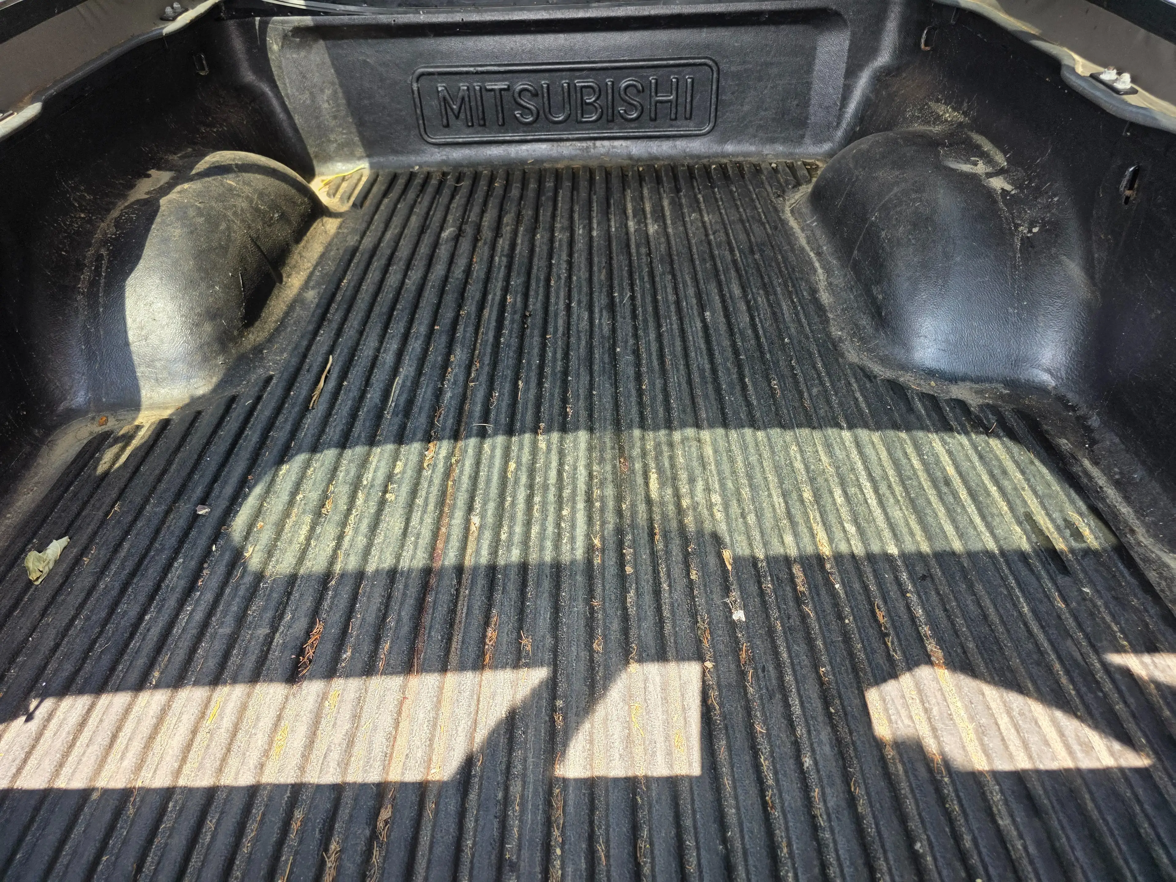 Mitsubishi L200 — photo 7