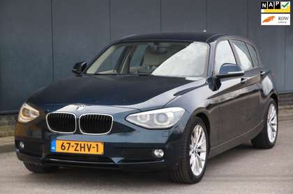 BMW 114 1-serie 114i Upgrade Edition Xenon/Navigatie/Leer/