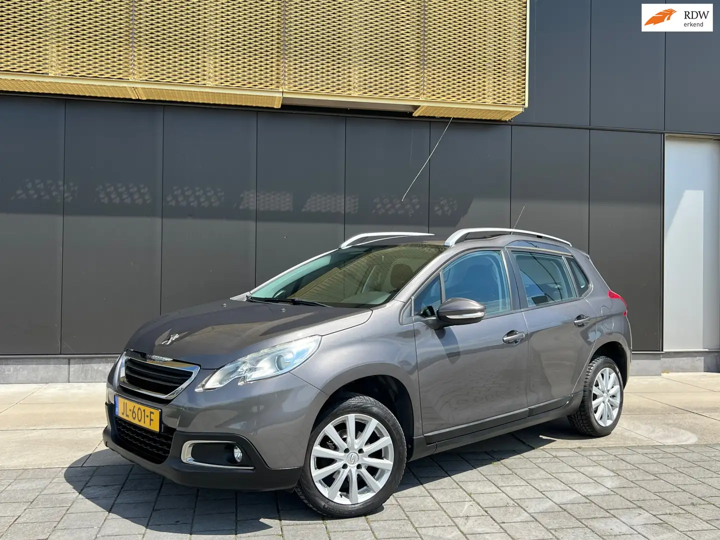 Peugeot 2008 1.2 VTi Active | Dealer onderh | Navi | Climate | Grau - 1
