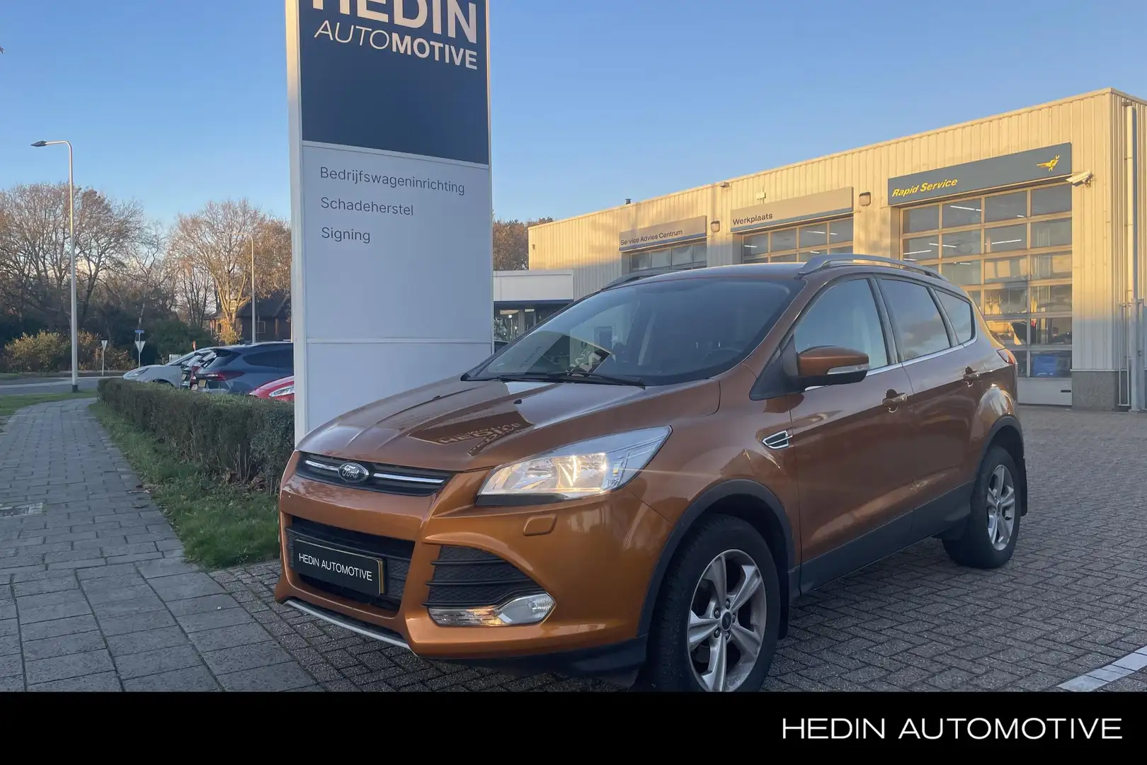 Ford Kuga 1.5 Titanium Oranje - 1
