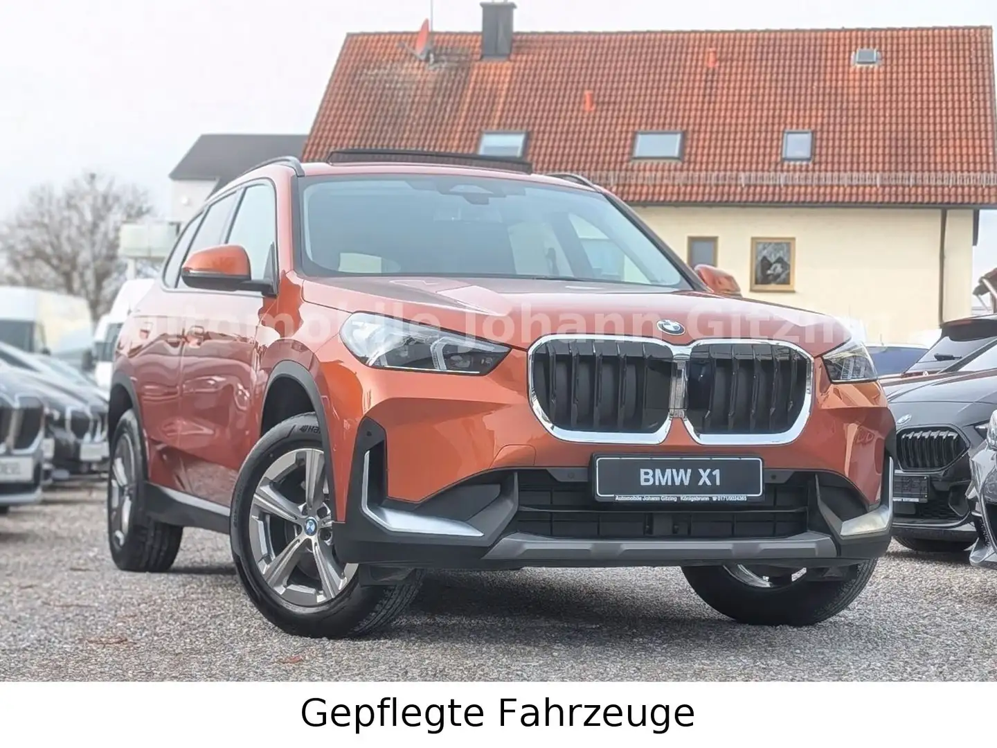 BMW X1 sDrive20i Travel-Paket AHK Pano Sportsitz TOP Orange - 1