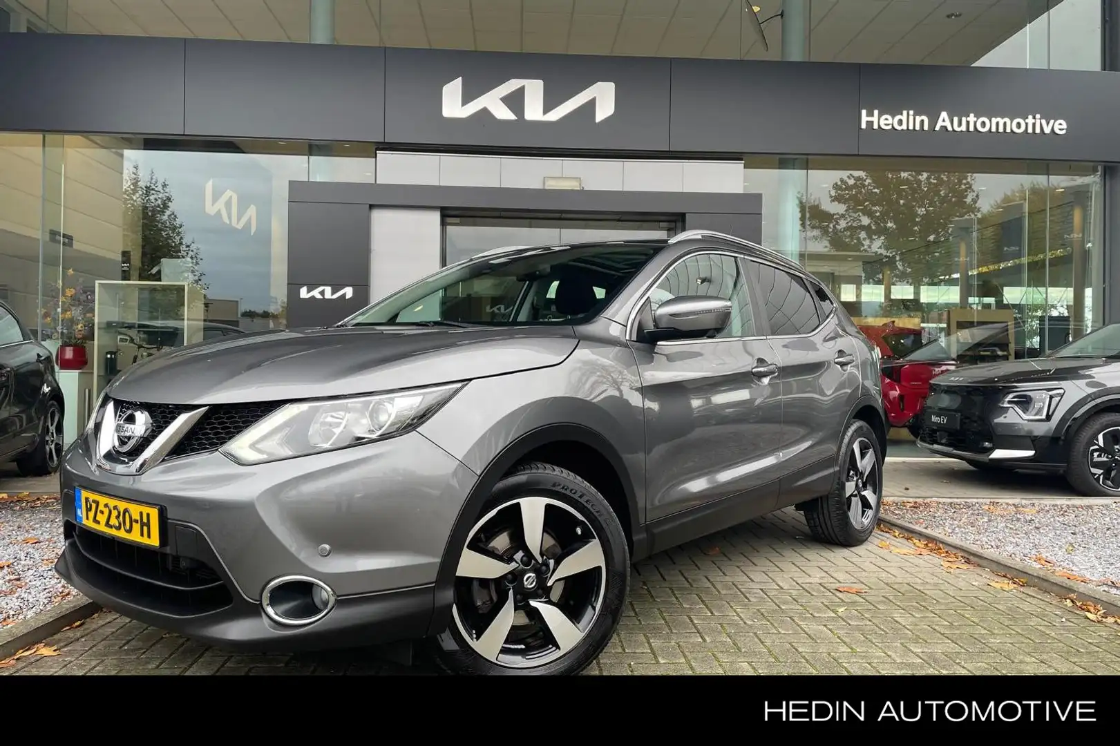 Nissan Qashqai 1.2 Tekna |Pano | 360 |  Navi | Stoelverw. | Trekh Grijs - 1