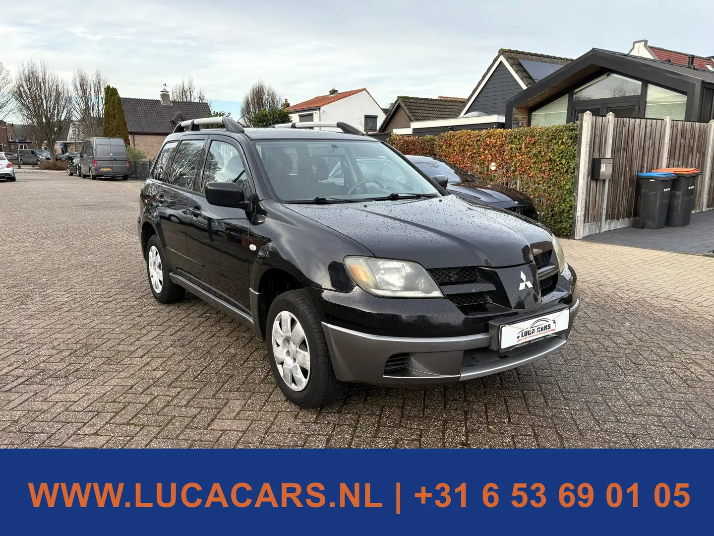 Mitsubishi Outlander 2.0 Comfort AIRCO + TREKHAAK! Schwarz - 2