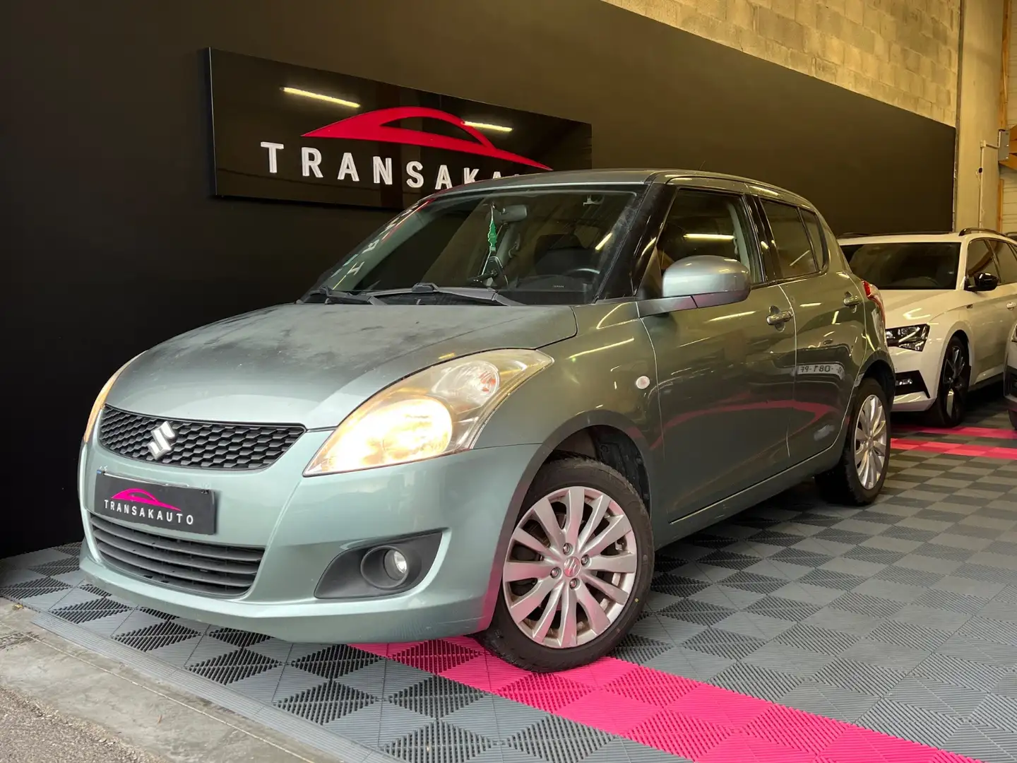 Suzuki Swift GLX 4X4 Vert - 1