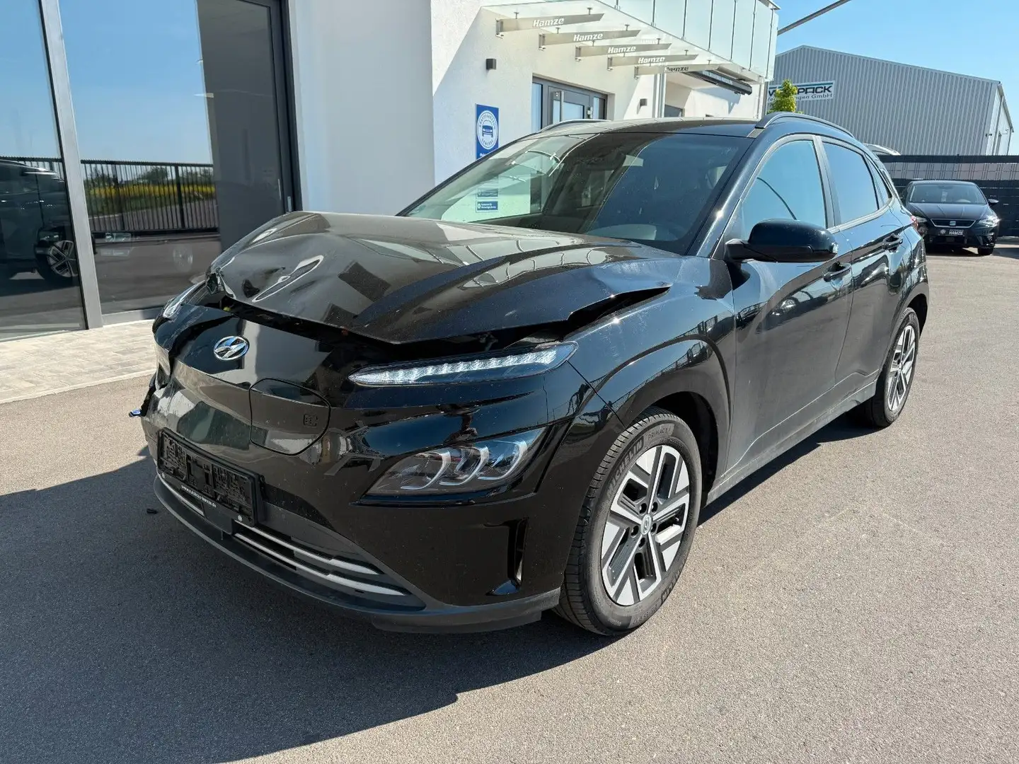 Hyundai KONA Basis Elektro 2WD|Kamera|Krell|Unfall Zwart - 1