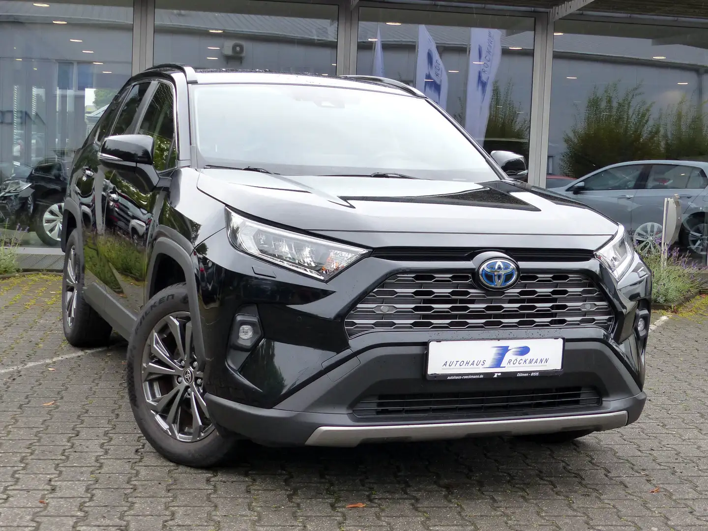 Toyota RAV 4 Hybrid 4x4 Aut. 222 Leder App Kamera DAB Schwarz - 1