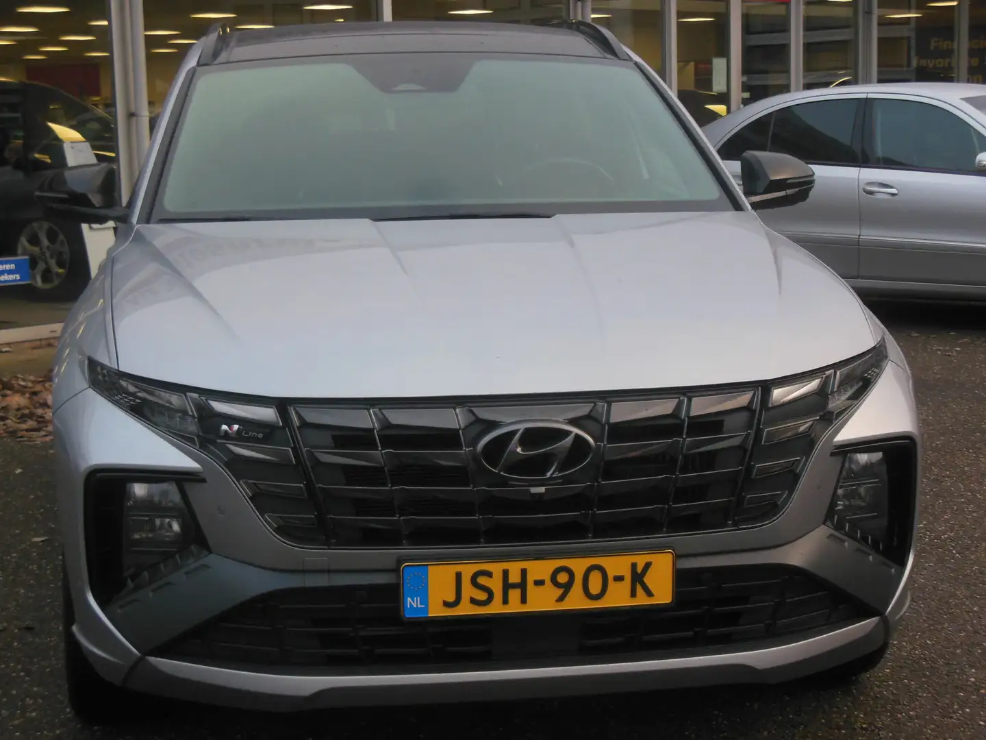 Hyundai TUCSON 1.6 T-GDI PHEV Premium Sky 4WD Staat in Hardenberg Grau - 2