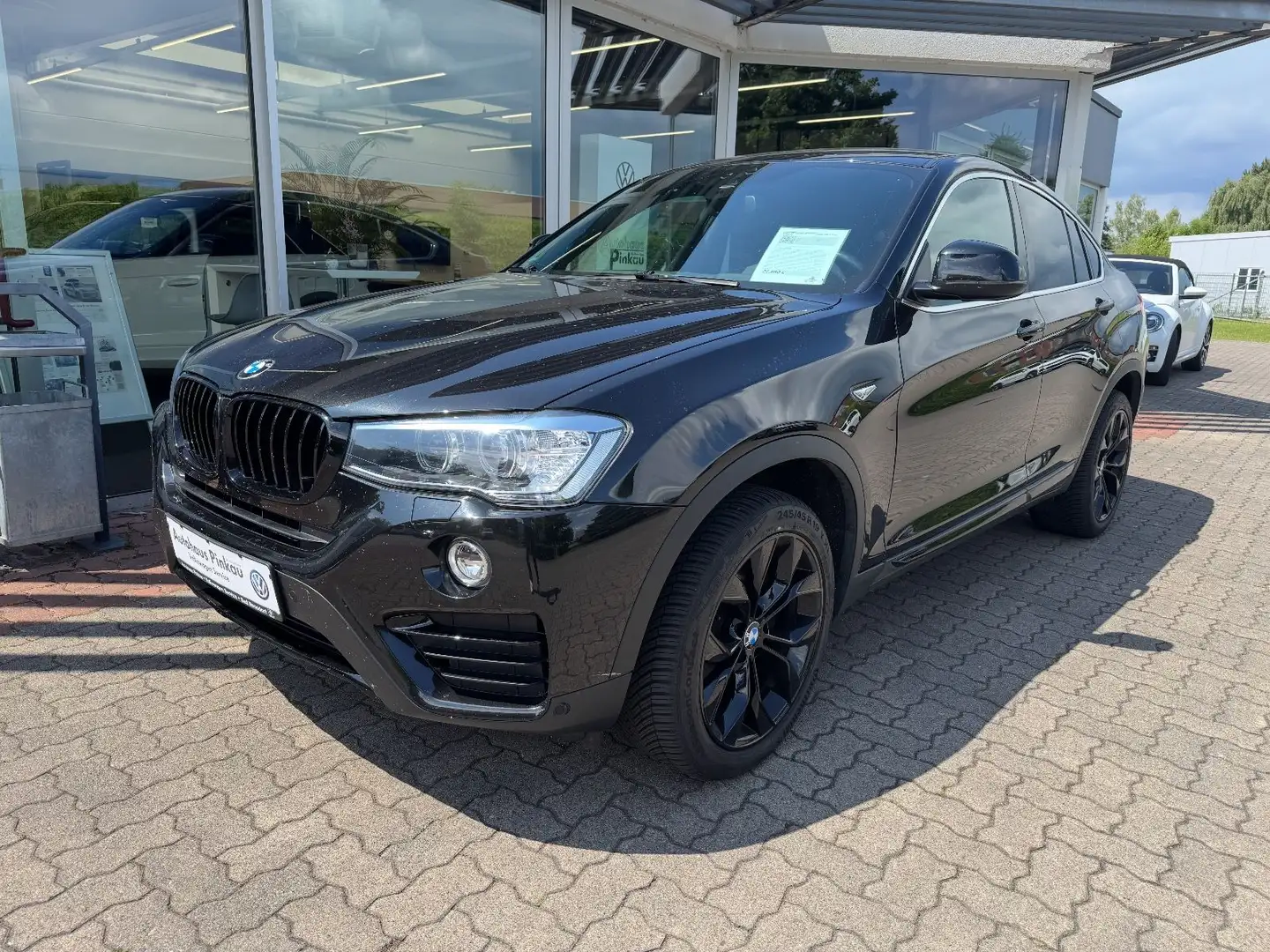 BMW X4 xDrive 20d xLine Leder NAVI AHK Head-Up Zwart - 1