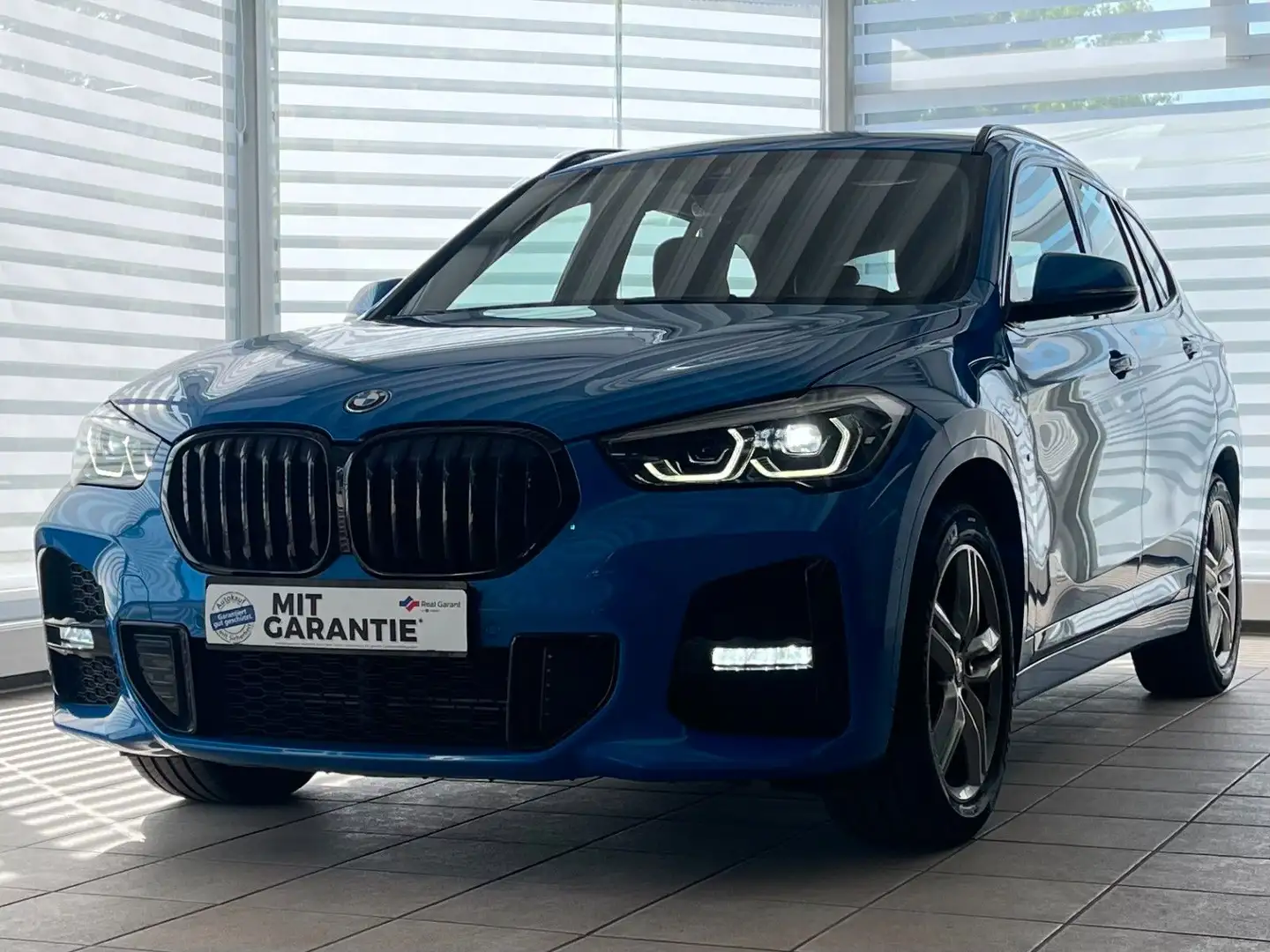 BMW X1 xDrive 25e Aut.M Sport Hybrid NaviPlus HUD Blauw - 1