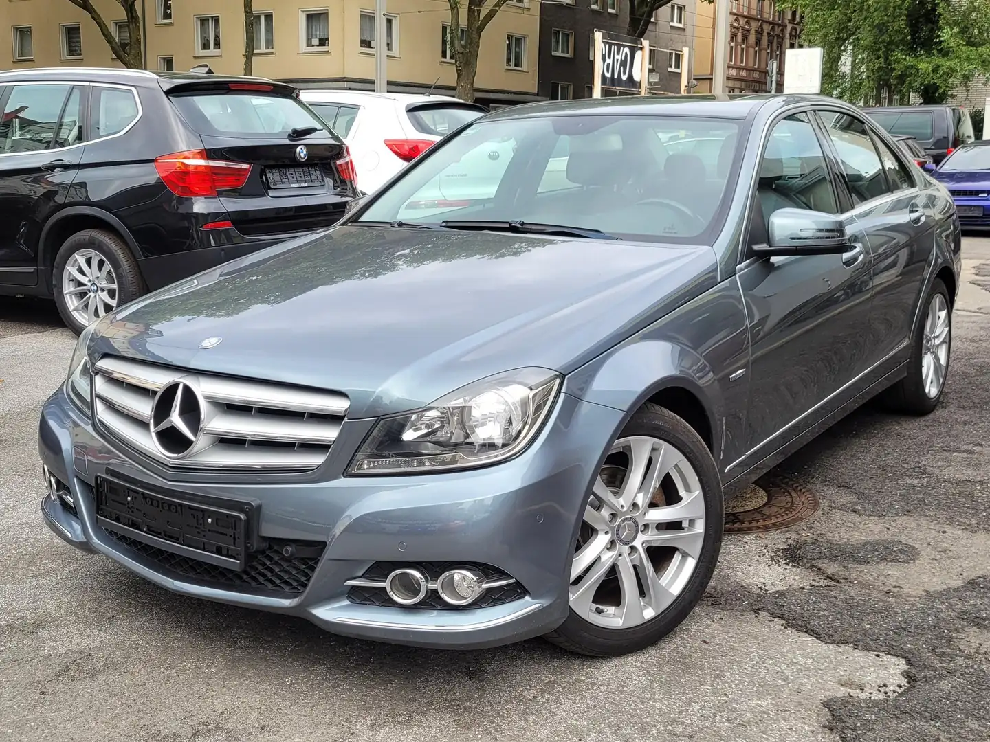 Mercedes-Benz C 180 7G CGI BE*Navi*Leder*SH*PDC*S-Dach*17"+Allwtr*AUX Grau - 1