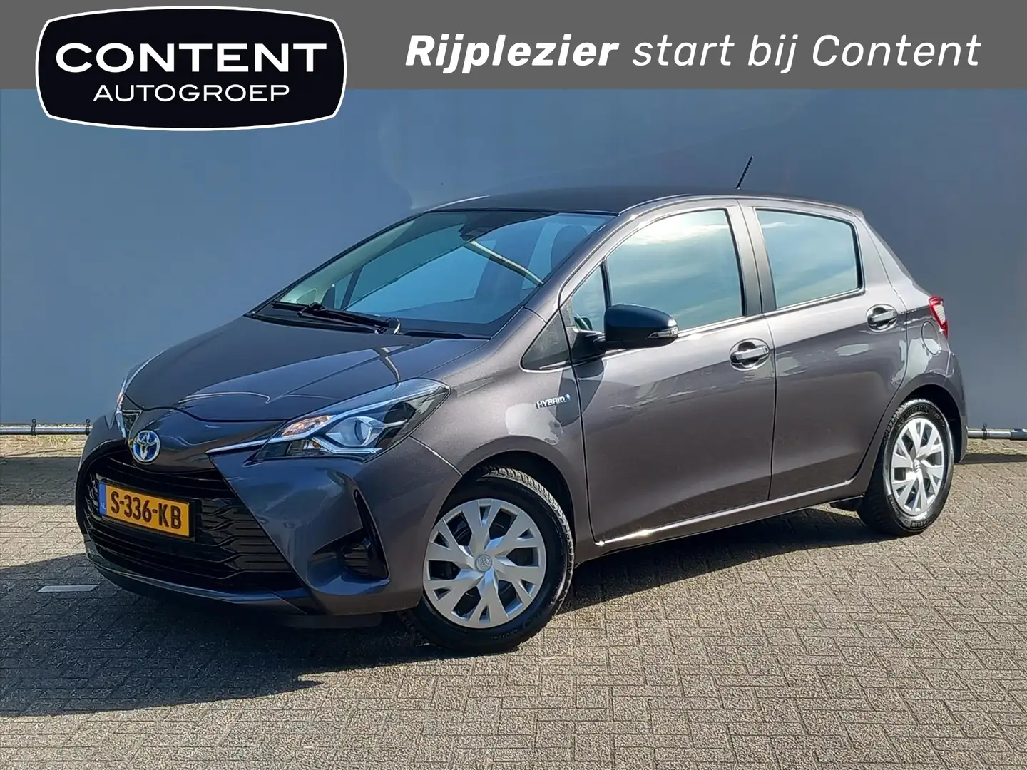 Toyota Yaris 1.5 Hybrid 100pk 5D Aspiration | Clima Grijs - 1