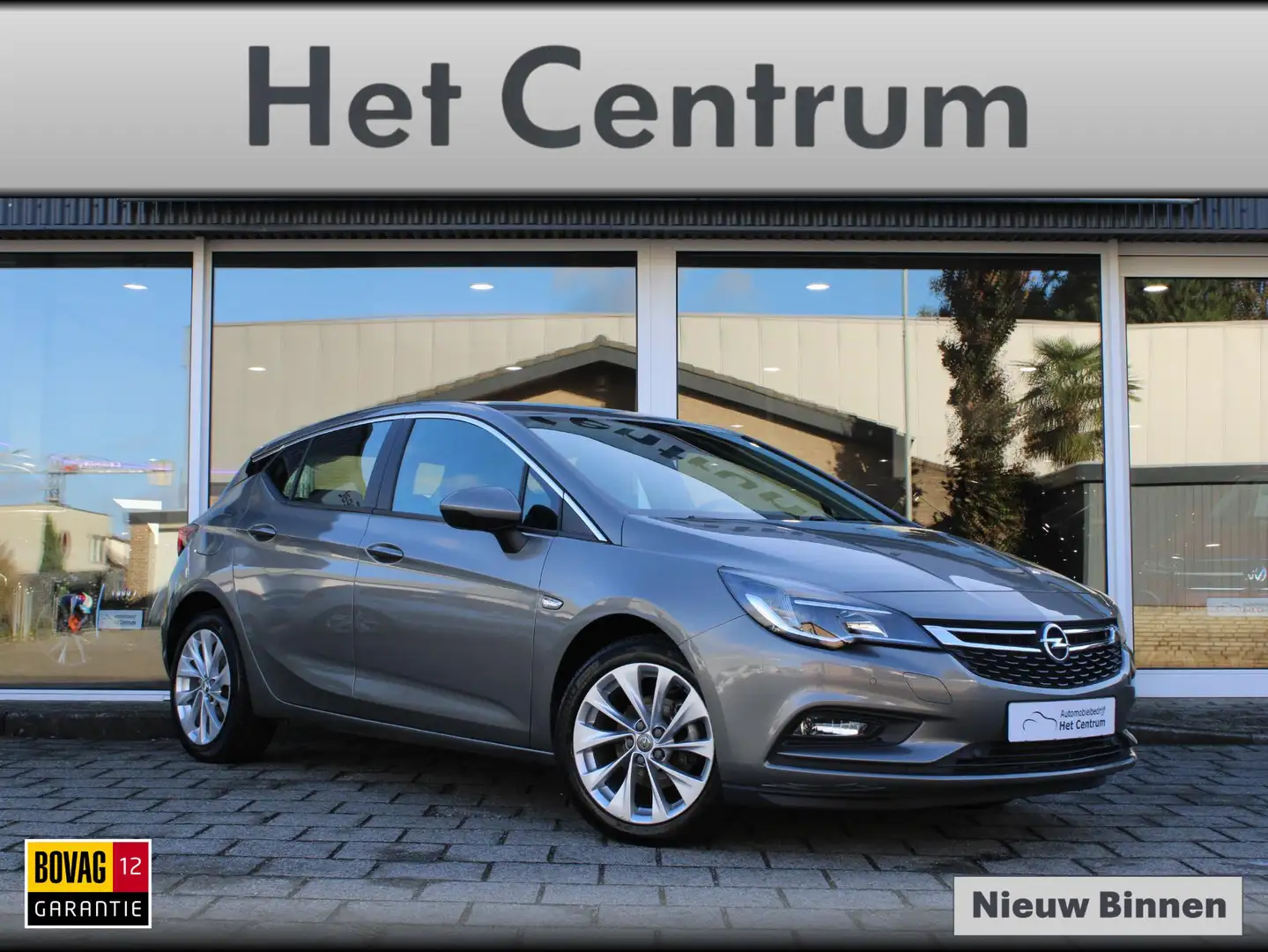 Opel Astra 1.4 150PK Automaat Business+ / Navigatie / LM Velg Bruin - 1