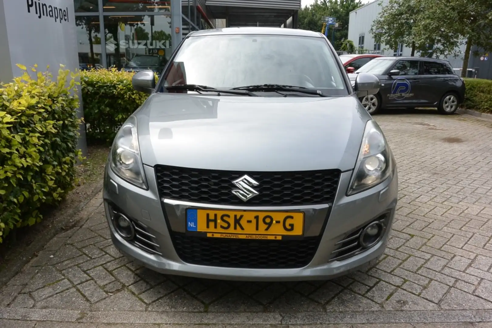 Suzuki Swift 1.6 Sport 5-deurs Airco/Spoiler/L.m.velgen Gris - 2
