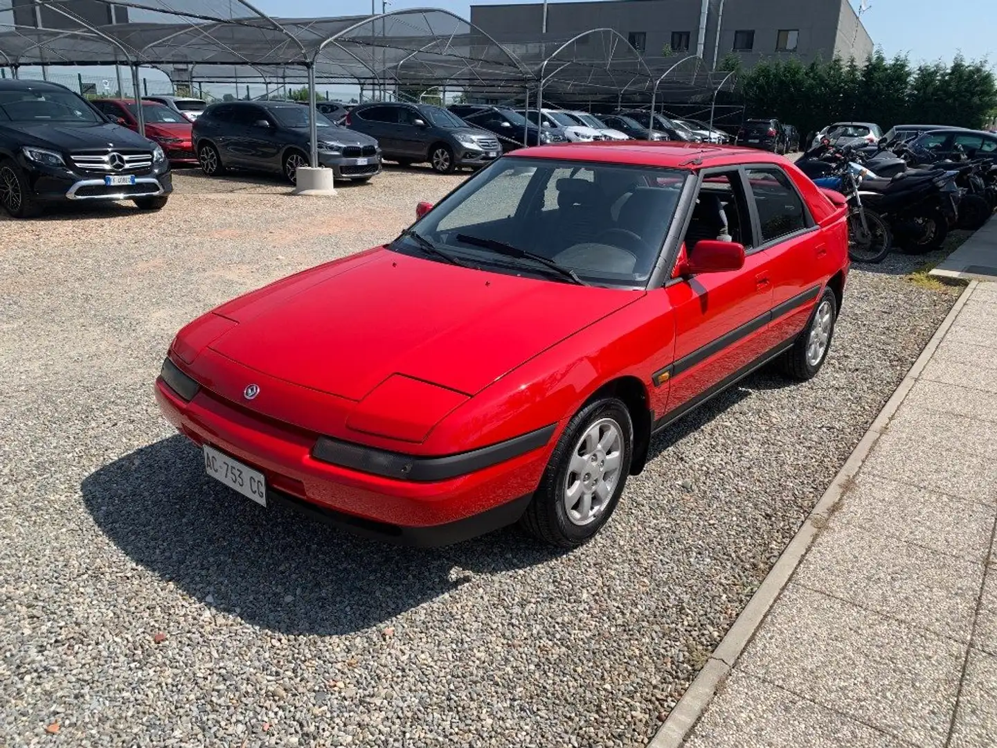 Mazda 323 1.8i  16V cat 5porte Rosso - 1