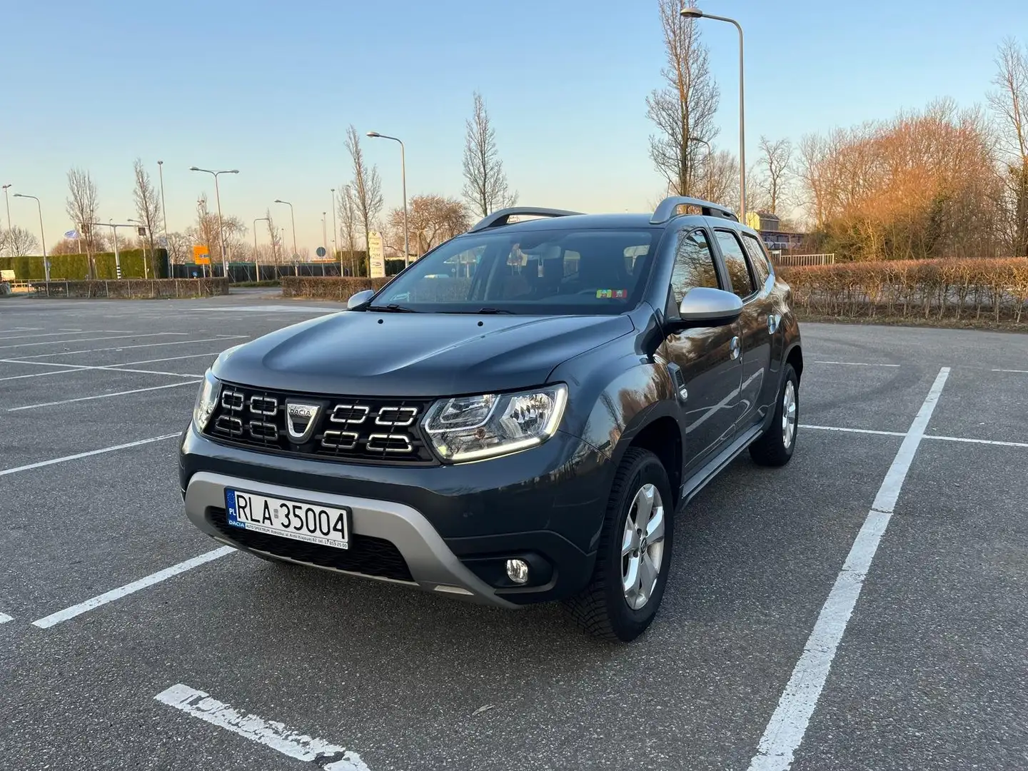 Dacia Duster 1.6 Prestige Grijs - 1