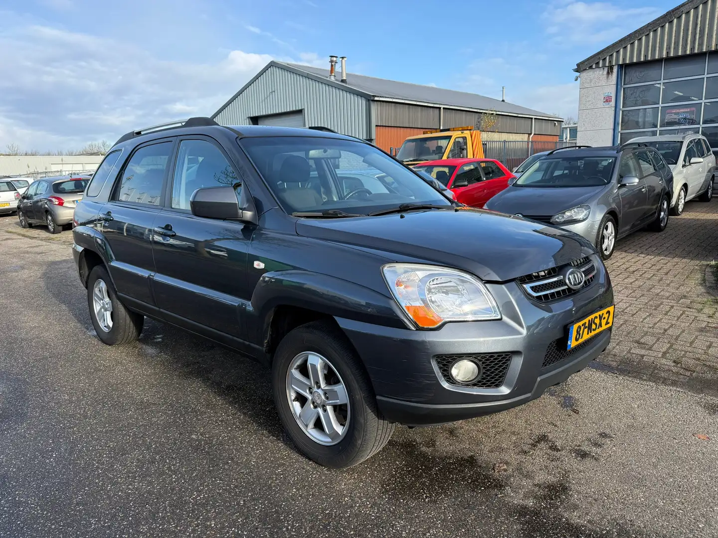 Kia Sportage 2.0 CVVT X-tra Airco Bj:2010 NAP! Grijs - 2