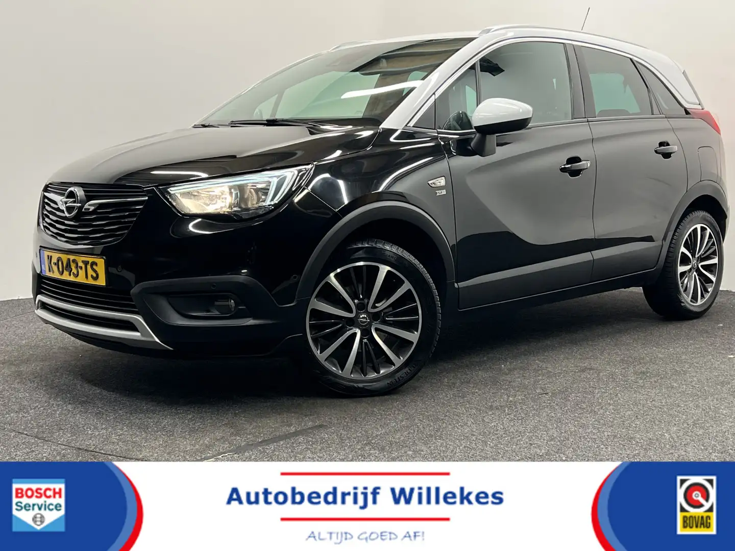 Opel Crossland X 1.2 Turbo Innovation | NAVIGATIE | CAMERA | CRUISE Zwart - 1