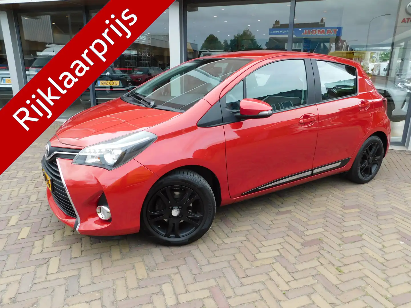 Toyota Yaris 1.3 VVT-i Trend | NAVI | TREKHAAK Rood - 1