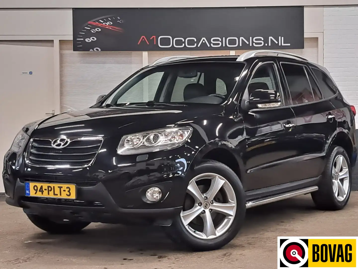 Hyundai SANTA FE 2.4i CVVT 4WD Style + LEDER + NAVI Zwart - 1