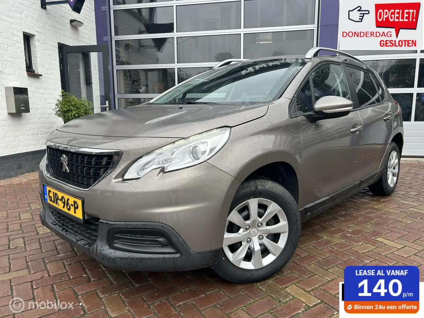 Peugeot 2008 1.2 PureTech Blue Lion * AIRCO * PDC Grijs - 1