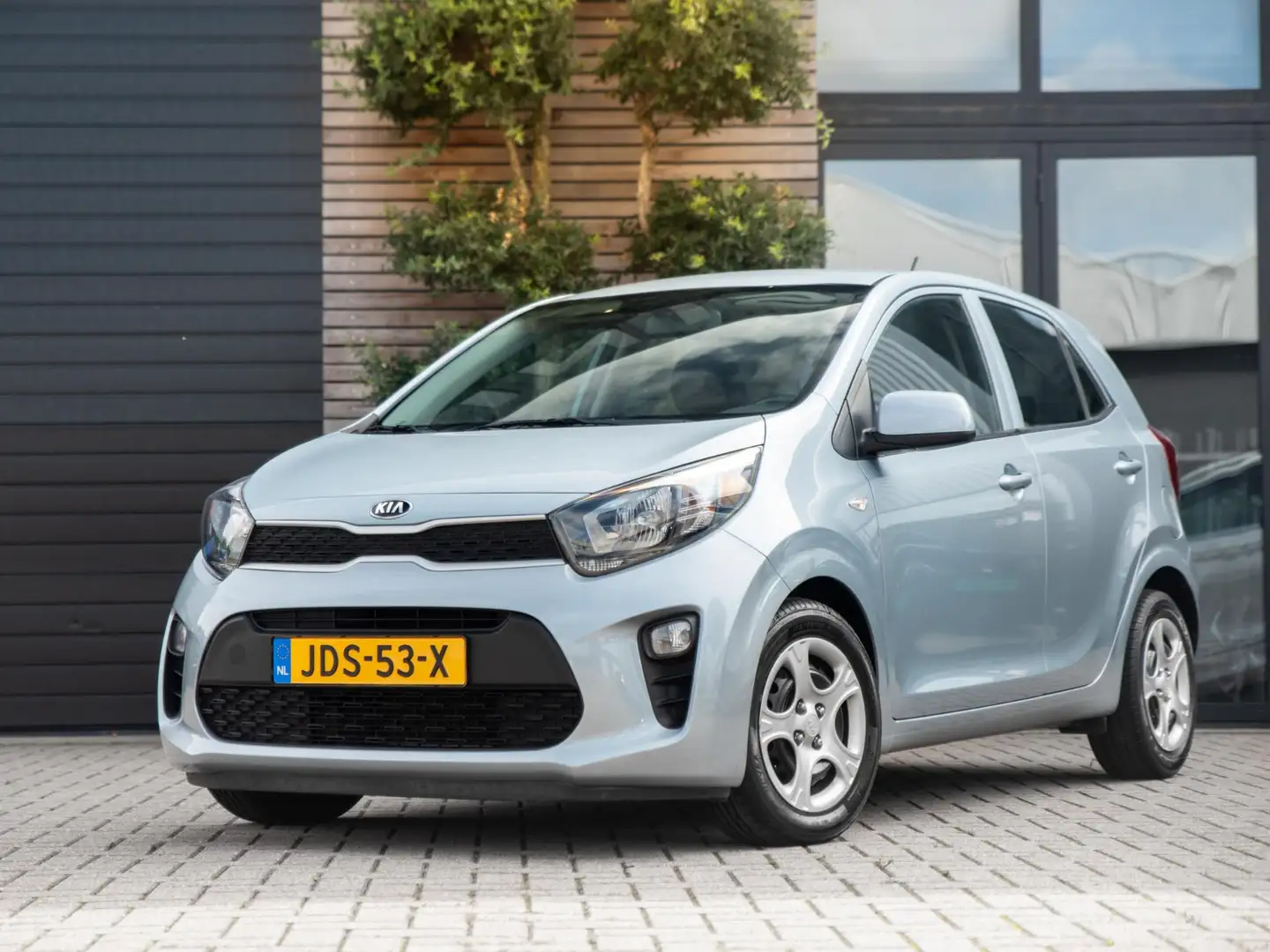 Kia Picanto 1.2 CVVT DynamicLine Airco Rijklaar NW APK Grijs - 1