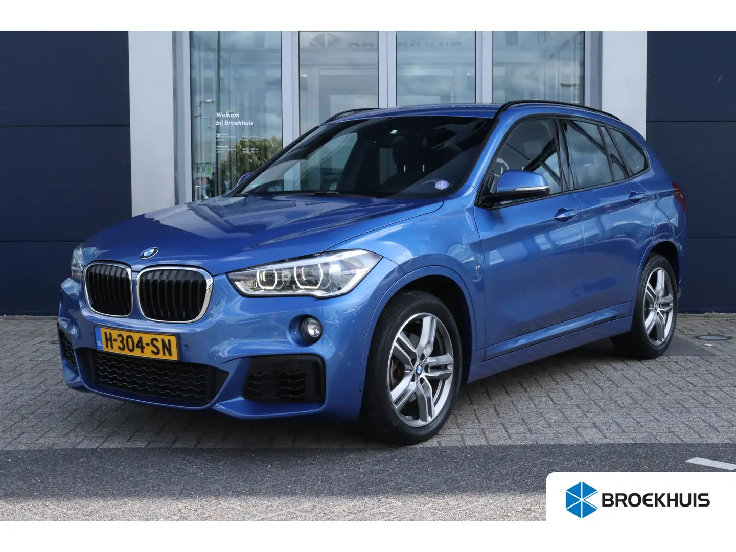 BMW X1 sDrive18i Executive | M-Sport | Cruise Control | S Blauw - 1