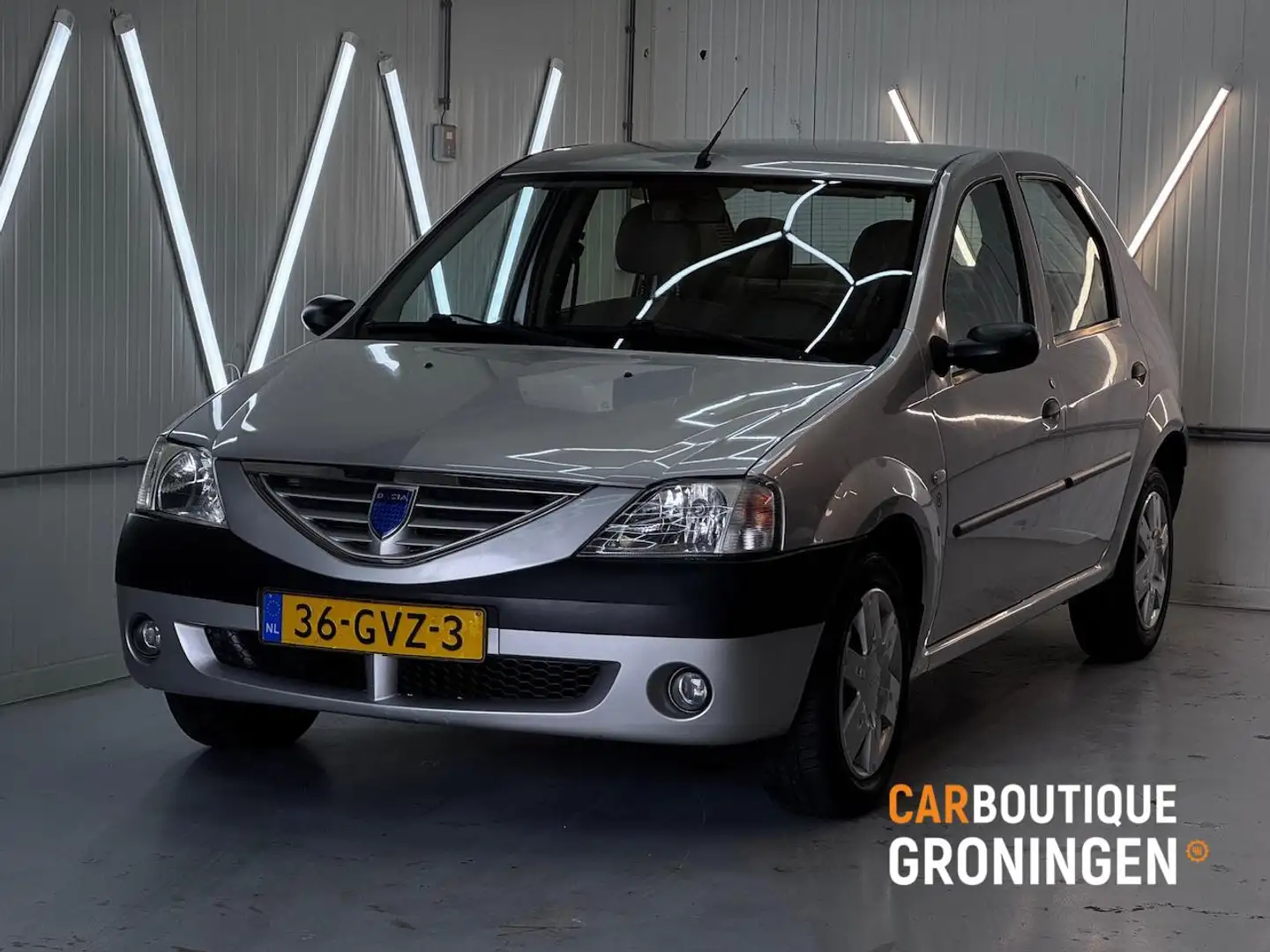 Dacia Logan 1.4 2008 | AIRCO | 87.xxx KM NAP | NIEUWE APK Grijs - 1