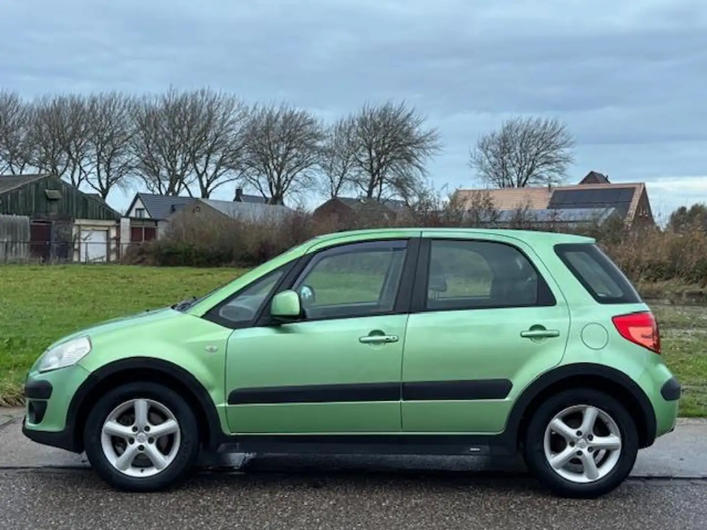 Suzuki SX4 1.6 Exclusive ECC Audio-CD/MP3 Electric pakket Cru Groen - 2
