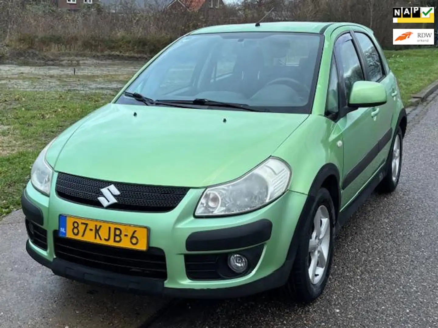 Suzuki SX4 1.6 Exclusive ECC Audio-CD/MP3 Electric pakket Cru Groen - 1